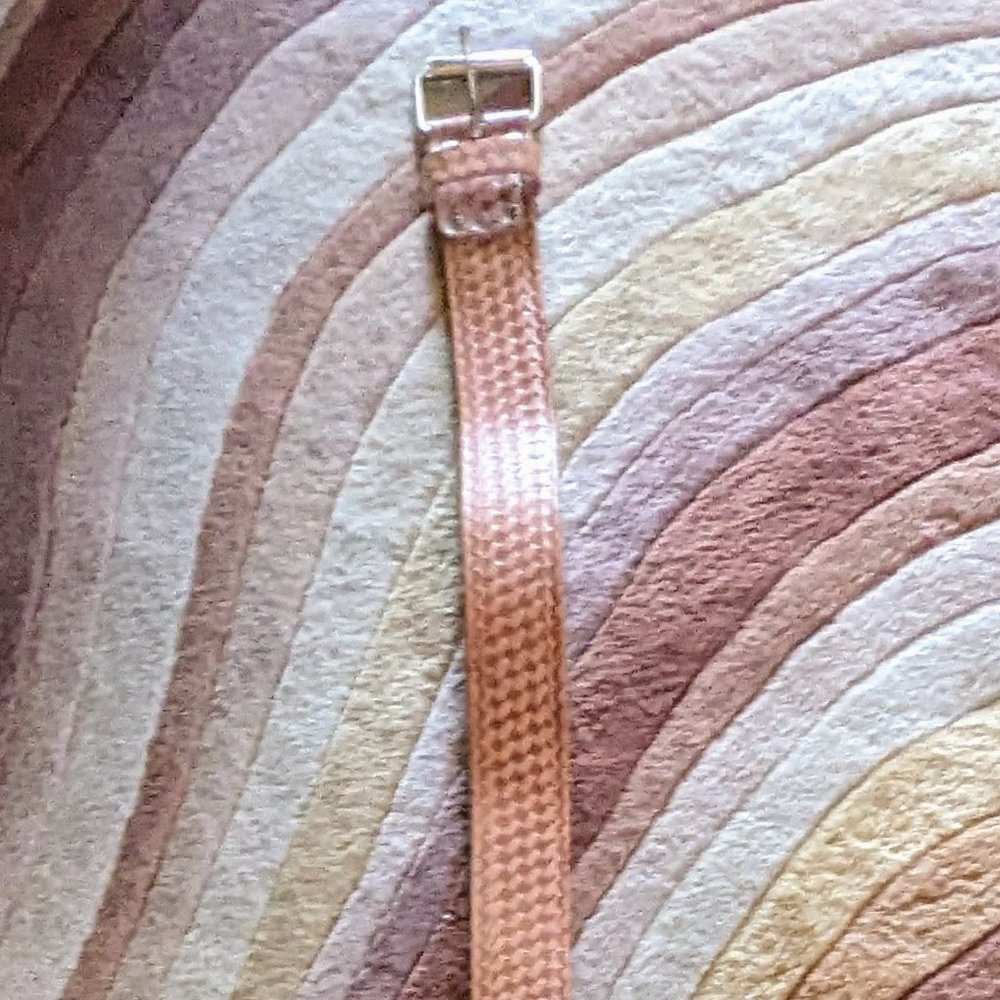 Custom LeatherCraft stamped tan belt